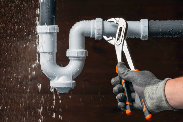 Professional Plumber technician working in Oak Brook, IL